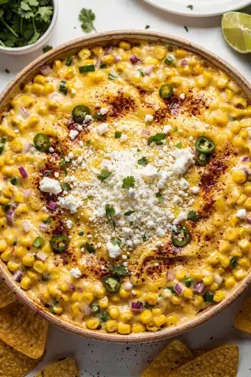 Baked Elote Dip 12 Creamy baked elote dip with crispy corn and melted cheese topping