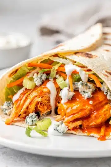 Buffalo Chicken Wrap 11 Buffalo chicken wrap with crispy lettuce, carrot, and creamy ranch dressing.