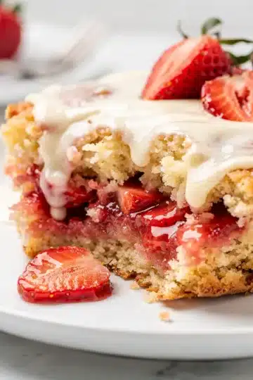 Strawberry Lemon Dump Cake 14 Golden brown strawberry lemon dump cake with almonds and vanilla ice cream.
