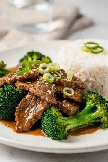 Beef and Broccoli Stir Fry 11 Cozy beef and broccoli stir fry with glossy sauce in a white bowl