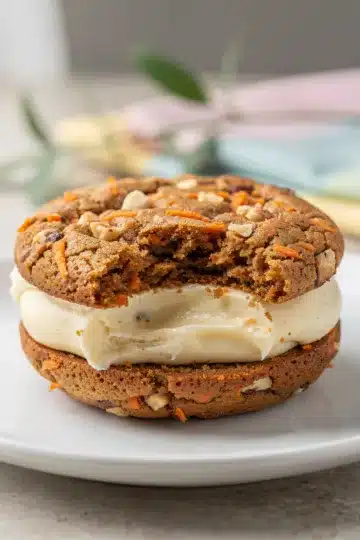 Carrot Cake Cookie Sandwiches 13 Moist carrot cake cookie sandwiches with creamy cream cheese frosting filling.