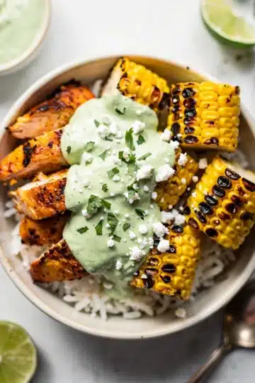 Chicken Street Corn Rice Bowls 13 Chicken street corn rice bowl with spiced chicken and zesty lime crema