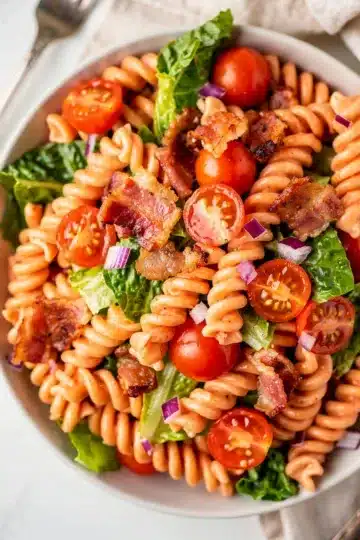 BLT Pasta Salad 11 Creamy BLT pasta salad with bacon, tomatoes, lettuce, and glossy dressing