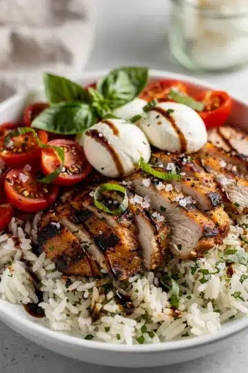 Grilled Chicken Caprese Bowls 12 Grilled chicken caprese bowls with rice, tomatoes, mozzarella, and balsamic glaze.