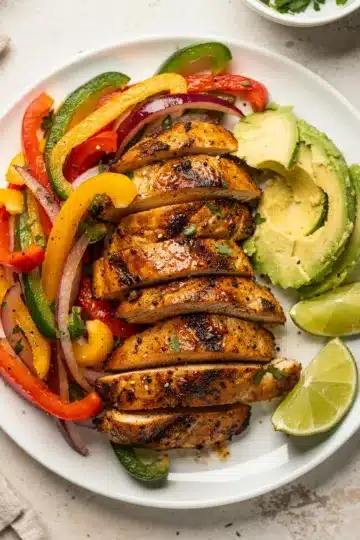 Sheet Pan Chicken Fajitas 11 Colorful sheet pan chicken fajitas with peppers and onions ready to serve