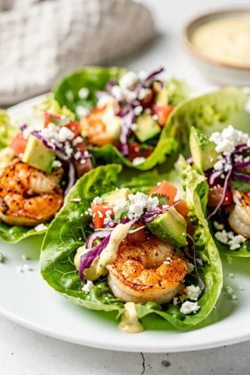 Shrimp Taco Lettuce Wraps 12 Juicy shrimp taco lettuce wraps with avocado and lime sauce