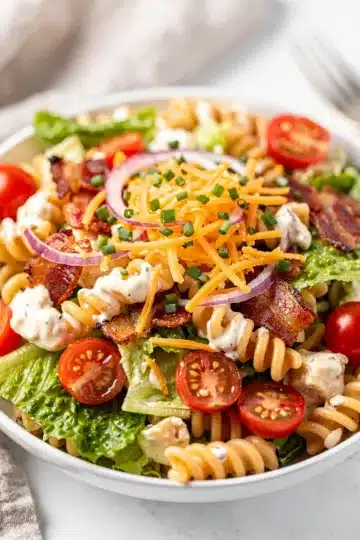 BLT Ranch Pasta Salad 14 Creamy BLT Ranch Pasta Salad with bacon, tomatoes, lettuce, and cheese.