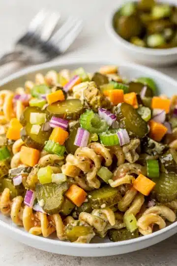Chopped Dill Pickle Pasta Salad 11 Creamy dill pickle pasta salad with crunchy celery and cheddar cheese