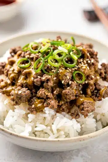 Creamy Korean Ground Beef Bowl 12 Creamy Korean ground beef bowl with glossy sauce over fluffy white rice