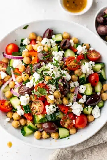 Crisp Mediterranean Chickpea Salad 14 Crisp Mediterranean chickpea salad with feta and fresh colorful vegetables.