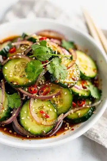 Crisp Spicy Asian Cucumber Salad 11 Crisp spicy Asian cucumber salad with sesame dressing and fresh cilantro.