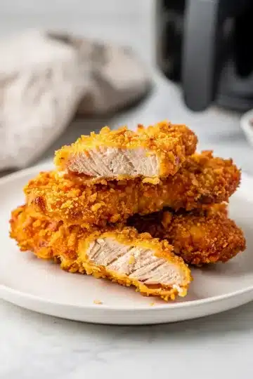 Air Fryer Chicken Tenders 12 Crispy air fryer chicken tenders with golden panko coating and honey mustard sauce.