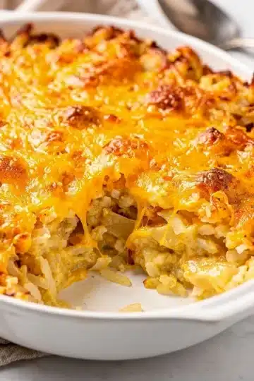 Easy Crockpot Cheesy Hashbrown Casserole 13 Easy crockpot cheesy hashbrown casserole with melted cheese and crispy potatoes.