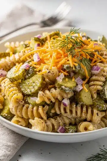 Fresh Dill Pickle Pasta Salad 13 Creamy dill pickle pasta salad with cheddar cheese and fresh herbs