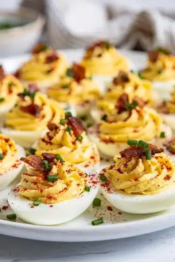Loaded Bacon Ranch Deviled Eggs 11 Creamy deviled eggs with bacon ranch filling topped with crispy bacon bits