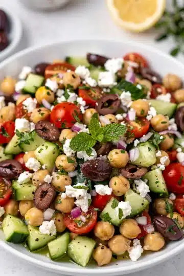 Chopped Mediterranean Chickpea Salad 11 Chopped Mediterranean chickpea salad with cucumbers tomatoes feta and creamy dressing
