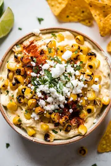 Classic Mexican Street Corn Dip 12 Creamy Mexican street corn dip with cotija cheese and chili powder.