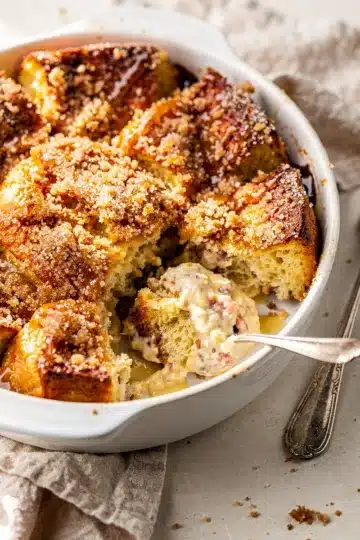 Easy Overnight French Toast Bake 13 Golden brown overnight French toast bake with cinnamon streusel and blueberries.