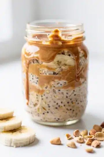 Make Ahead Peanut Butter Banana Overnight Oats 12 Creamy peanut butter banana overnight oats in a mason jar with chia seeds