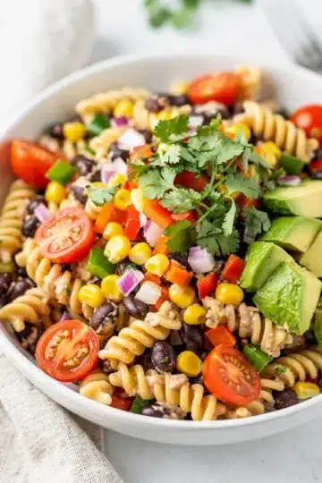 Southwest Black Bean Pasta Salad 12 Colorful Southwest black bean pasta salad with fresh vegetables and creamy cilantro lime dressing.