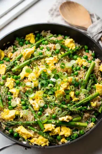 Spring Vegetable Fried Rice 1 Colorful spring vegetable fried rice recipe with glossy sauce and crispy textures.