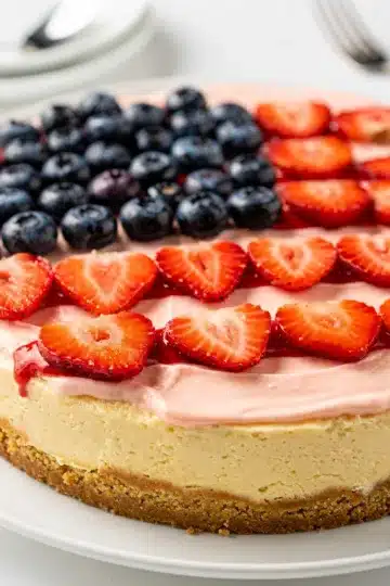 American Flag Strawberry Cheesecake 12 American flag strawberry cheesecake with glossy berry glaze