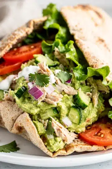 Avocado Chicken Salad Stuffed Pita 28 Creamy avocado chicken salad stuffed in a soft whole wheat pita pocket.