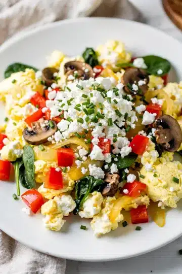 High Protein Egg White Veggie Scramble 13 High protein egg white veggie scramble with colorful peppers and spinach