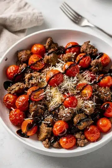 Italian Sausage and Cherry Tomato Skillet 12 Italian Sausage and Cherry Tomato Skillet with basil and cheese.