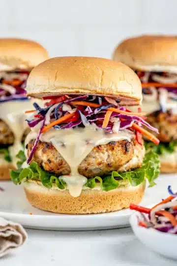 Patriotic Star Spangled Chicken Sliders 14 Grilled chicken sliders topped with red cabbage and blueberry slaw for a patriotic meal.