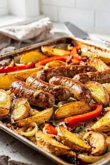 Sheet Pan Italian Sausage and Potato Wedge Bake 5 Crispy sheet pan Italian sausage and potato bake with peppers and onions.