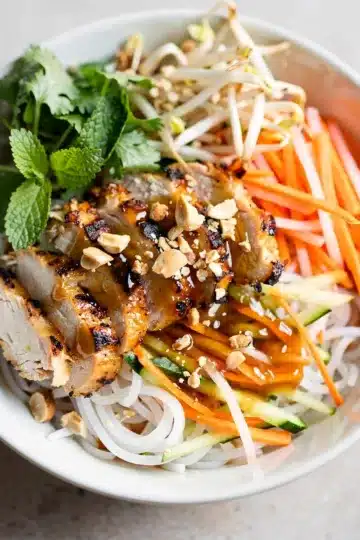 Vietnamese Vermicelli Noodle Bowl 13 Vietnamese Vermicelli Bowl with grilled lemongrass chicken closeup
