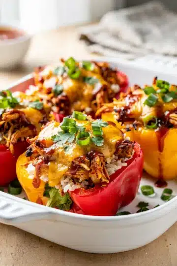 BBQ Chicken and Rice Stuffed Bell Peppers 11 BBQ chicken rice stuffed vibrant bell peppers cheesy delicious