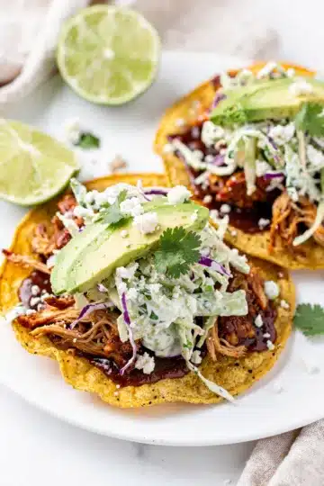 BBQ Chicken Tostadas with Cilantro Lime Slaw 11 BBQ chicken tostada with creamy cilantro lime slaw close up