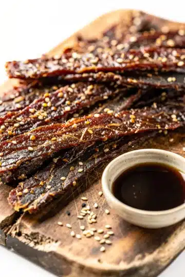 Teriyaki Turkey Jerky Strips 13 Teriyaki Turkey Jerky Strips with glossy caramelized glaze.