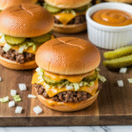 Copycat Big Mac Sliders Recipe 8 Copycat Big Mac Sliders recipe on rustic wooden board