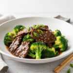 Chinese Beef and Broccoli (One Pan Take-Out) 8 Chinese Beef and Broccoli recipe with glossy dark sauce.