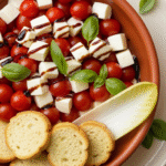 Easy Caprese Dip 8 Easy Caprese Dip with fresh mozzarella and balsamic glaze.