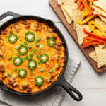 Meaty Texas Trash Dip 6 Meaty Texas Trash Dip with chips and peppers for dipping.