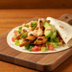 Spicy grilled chicken wrap with chipotle mayo and fresh avocado