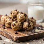 Healthy no-bake cookie dough balls with mini chocolate chips for protein.