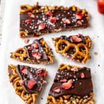 Crispy chocolate bark with pretzels, strawberries, and a sprinkle of sea salt.