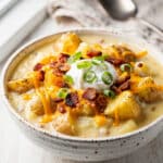 Creamy loaded baked potato soup with bacon and melted cheddar cheese.