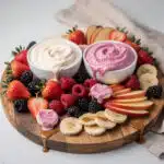 Healthy Valentine's treat platter with fresh fruit and creamy yogurt dip.