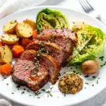 Oven braised corned beef and cabbage recipe with tender beef and soft vegetables