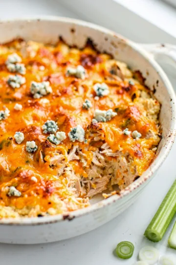 Creamy buffalo chicken dip with cheddar and blue cheese crumbles.