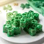 Festive green shamrock rice krispie treats for St. Patrick's Day dessert.