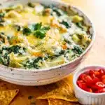 Creamy homemade spinach artichoke dip recipe with vibrant fresh ingredients.