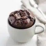 Chocolate mug cake recipe with a tender crumb and glossy chocolate chips