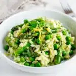 Creamy asparagus pea risotto recipe with vibrant colors in close up view